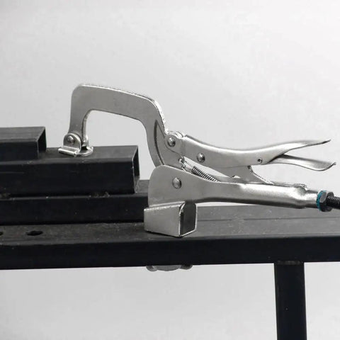 Drill Press Clamp With Crank Handle For Quick Set Hold Down Repetitive Clamping Tool on workbench, side view