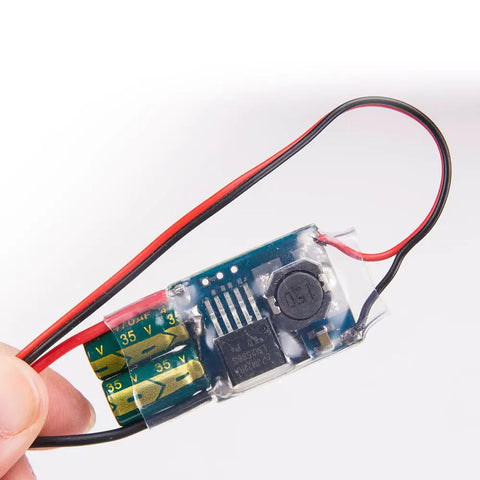 Close-up of Two Pack UBEC 5V 5A External BEC Voltage Regulator Anti Jamming Switching Regulator for RC Servos.