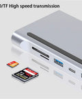 Close-up of Slick 12 In 1 Type C Hub With Dual HDMI 4K Display And Gigabit LAN Plus Plug And Play PD Fast Charging, showing SD/TF slots.