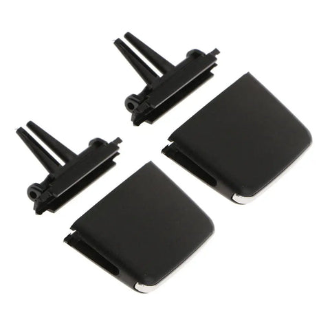 Direct Plug And Play No Splice Air Vent Clip Kit For BMW 3 Series E92, Easy Install With Factory Connector, Durable Black Plastic, No Cutting Needed, Compact Clip Design, Secure Fit For Stock Air Vents. Black plastic BMW E92 air vent clip kit with two replacement clips.