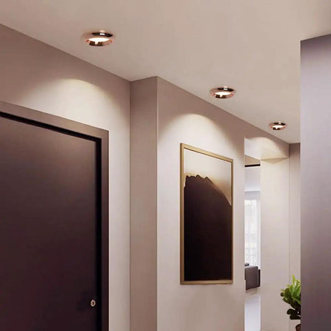 saditesdk 15 Pack Recessed Lighting Housing Trim Kits Rose Gold Led Ceiling Lamp Anti-Glare Led Downlights 5W 3000K/ 4000K/ 6000K Dimmable installed in modern hallway.
