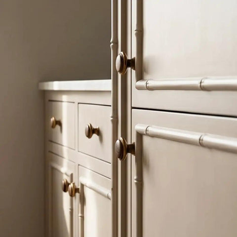 Close-up of kitchen cupboard with Vintage Walnut Wood Cabinet Handles Set With Zinc Alloy Drawer Pulls in Antique Metal Finish.