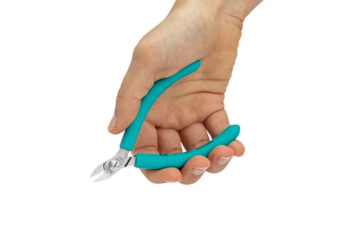 Four And A Quarter Inch Magic Diagonal Small Head Cutter With Full Flush Cut For Micro Precision Blue And Silver Finish in hand