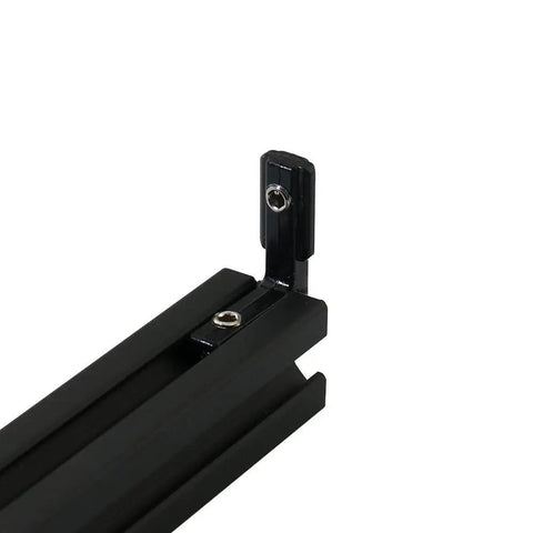Black T-slot L shape corner bracket on aluminum extrusion profile for 2020 series, includes screws, designed for hidden interior corners.