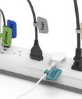 Large Write On Cable Labels Set For Home And Office on a power strip, cord labels with hook and loop closure for easy management.