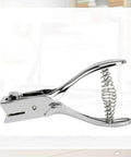 Heavy Duty Single Oval Hole Puncher for Scrapbooking Handheld Paper Cutter With Clear Alignment Window, chrome finish shown in side view.