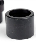 Close-up of One Half Inch Conduit Punch And Die For Hydraulic Knockout Driver Kit, black metal cylinder, punch for 0.86 inch holes.