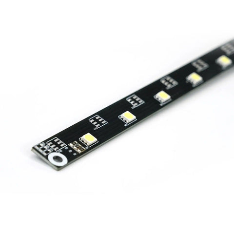 Close-up of Lit LED Light Strip For Adventurer 5M Pro 3D Printer showing LEDs on black strip, enhancing work area visibility.