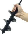 Hand holding 4 Inch By 12 Inch Garden Auger Drill Bit For Planting Bulbs And Flower Beds Planters with 3/8 Inch Hex Drive