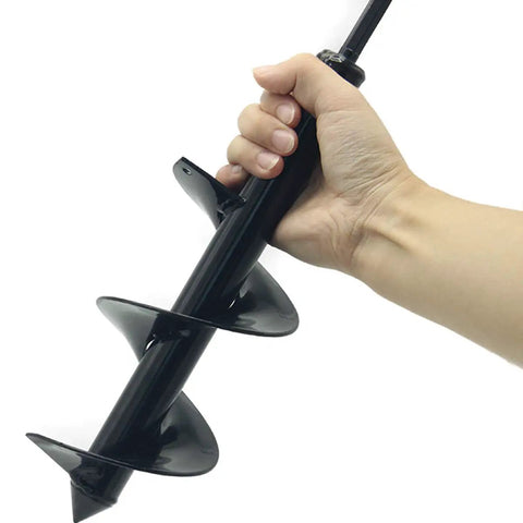 Hand holding 4 Inch By 12 Inch Garden Auger Drill Bit For Planting Bulbs And Flower Beds Planters with 3/8 Inch Hex Drive