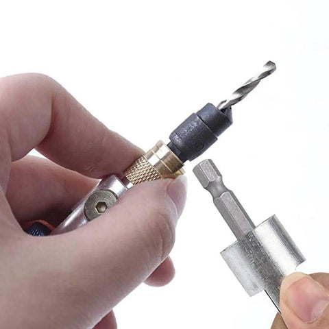 Person holding 20Pcs Quick Change Drill Bit Set With Swivel Head Driver And Flip Drive; showing close-up of drill bit and driver.