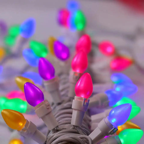 Easter String Lights LED Multi Color Glass C3 Bulbs 50 Count For Party Vibes On Patio And At Home, white wire, close-up view