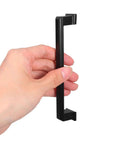 Hand holding Dope Matte Black Aluminum Cabinet Door Handles and Drawer Pulls, Vintage Retro Kitchen Hardware