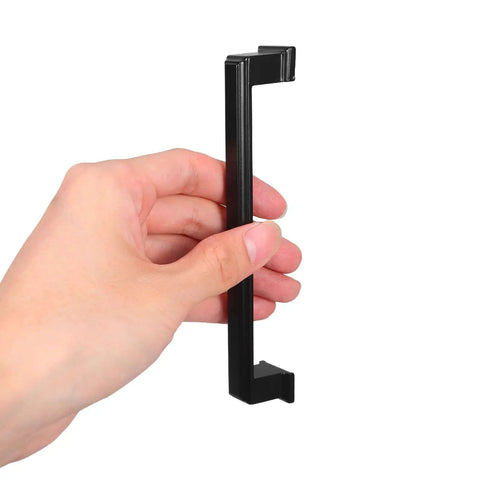 Hand holding Dope Matte Black Aluminum Cabinet Door Handles and Drawer Pulls, Vintage Retro Kitchen Hardware