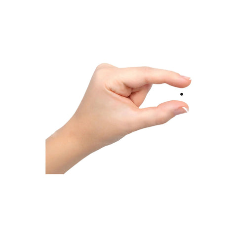 Close-up of a small black silicon nitride ceramic bearing ball held between fingertips