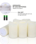 Flickering Flameless LED Candles Real Wax Pillar Set Of 6 With 10 Key Remote Control, battery compartment details shown