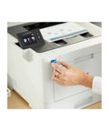 User connecting a USB drive to a High Output Color Laser Printer With Frictionless Wireless Connection And Automatic Duplex Printing Optimized For Budget Conscious Buyers Who Want Serious Bang For Their Buck Daily.