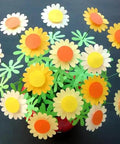 Colorful paper flowers made using the Circle Punch 1.2 Inch 30mm Craft Lever Punch for Scrapbooking and Card Making Gift Tags and DIY Paper Crafts.