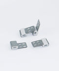 Top Shelf Heavy Duty 10 Piece Sofa Spring Clips Furniture Upholstery Repair Kit With 40 Screws showing three zigzag clips.