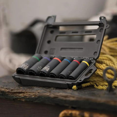 Color-coded impact socket set with open box, featuring Two In One Impact Socket With Hands Free Size Swap, Deep 12 Point, Coaxial Spring Loaded.