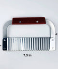 Wavy crinkle cutter with wooden handle and stainless steel blade, 7.3 in long