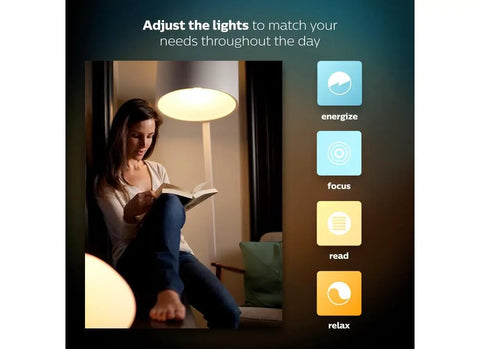 Woman reading under White And Color Ambiance A19 60W Equivalent Dimmable LED Smart Bulb With 16 Million Colors Dope Lighting Vibes