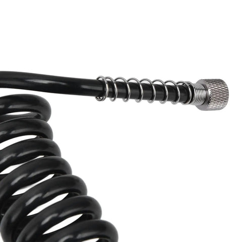 Top Tier Polyurethane Coil Air Hose Featuring G 1 8 Female Thread Connection Designed For Airbrush And Paint Projects High Flexibility Ensures Smooth Movement Without Kinking 2 Meter Length Great For Fans Looking To Upgrade Their Setup Now For Workshop close-up of black 2m polyurethane coil air hose with G1/8 female threaded end