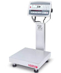 Heavy Duty Stainless Steel Washdown Bench Scale With Column 25 Pound Capacity High Precision NTEP Approved Digital Counting Scale on a factory floor.