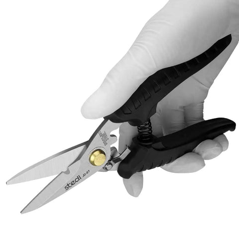 Heavy Duty Multi Purpose Shears With Tough As Nails Serrated Stainless Steel Blades And No Slip Comfort Grip held in gloved hand.