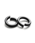 Two Three Eighths Inch Split Lock Washer Set, 50 Pack, Black Oxide 304 Stainless Steel Spring Lock Washers on a white background.
