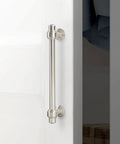 5-inch brushed satin nickel cabinet handle mounted on a cabinet door, showcasing zinc alloy heavy-duty drawer pull with elegant silvery finish