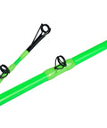 Close-up of Beast Catfish Rod, 7 Ft, Medium Heavy, One Piece, Glow in the Dark, showing green body with guides and tip detail