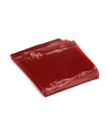 Red transparent welding curtain screen with UV and blue light protection, folded, for clear visibility and noise reduction in shops.