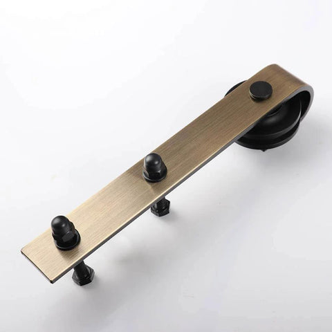 Brushed Gold Barn Door Hardware Kit For Interior Doors Heavy-Duty Carbon Steel Sliding Roller Set With Classic J Rail 200 Pounds Capacity Fits Doors 1.38 To 1.57 Inches Thick Includes 2 Rollers 2 Stoppers 2 Anti Jump Pads And 1 Floor Guide
