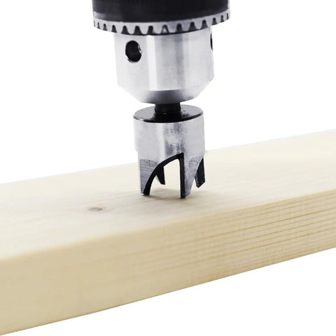 Close up of Kickass Eight Piece Wood Plug Cutter Drill Bit Set Made From Heavy Duty Carbon Steel cutting into wood.