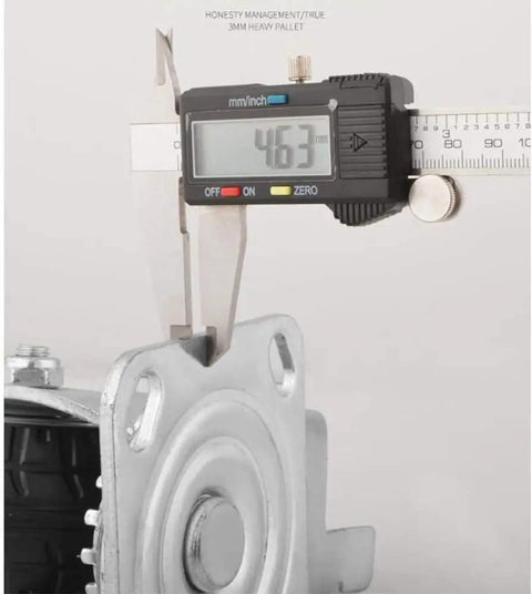 Four Pack Heavy Duty Rubber Caster Wheels With Locking Brake And Fixed Set Premium Industrial Casters Smooth Silent Glide Grippy Tires For Shop Furniture And Heavy Gear Rock Solid Everyday Reliable Performance measuring 4.63 inches with digital caliper.