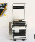 Badass Heavy Duty Semi Automatic Round Bottle Labeling Machine Zero Hassle Setup Quick 20 To 40 Bottles Per Minute front view with rollers.