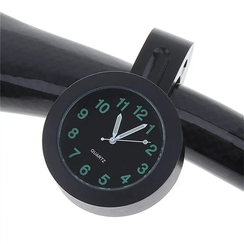 Premium Billet Aluminum Motorcycle Clock With Easy Handlebar Mount on black handlebar, featuring quartz movement and secure clamp.