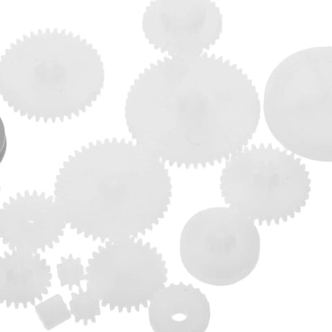 Top-Shelf Mini Plastic Gear Kit With Mechanical Project Parts Small Motor Components And DIY Hobby Accessories For School Engineering Models, assorted white gears.