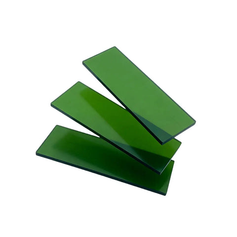 Badass Laser Safety Window Panel, Heavy Duty Protective Filter Shield Blocks Harmful Light from 900 to 1100Nm, stacked green filter panels.
