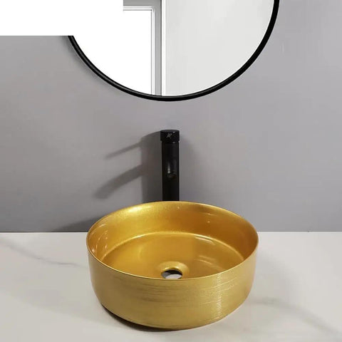 Bathroom Sink Bathroom Sink Home Bathroom Vessel Sink Modern Art Basin Hotel Apartment Bathroom Wash Basin Round Golden Counter Basin Bathroom Sink Vessel view with round golden basin and black faucet.