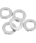 Stainless steel split lock washers, six pieces, top view for screws and bolts