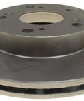 Raybestos 980059R brake rotor, front-angle view showing central hub and lug holes