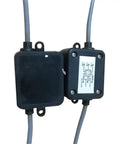 Close-up of a dual-joint linear position sensor with eye rod, showing casing and wiring for CNC routers and milling machines.
