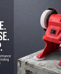 Heavy Duty Badass Mini Bench Grinder Featuring Dual 70 Mm Wheels Kicking Out 5500 Rpm For Rad Metal Shaping And Deburring Using Any 18V Battery Pack For Your Workshop on a work surface.