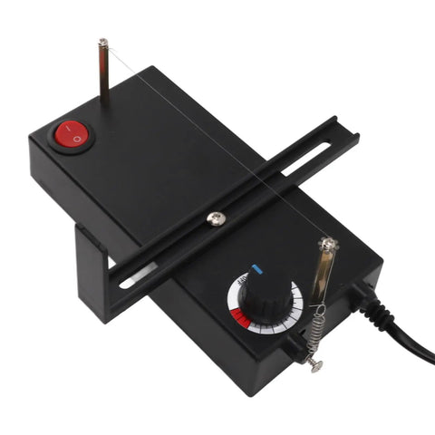 Top view of Hot Ribbon Cutter With Adjustable Heat 100 To 600 C, compact electric tool with adjustable settings for crafting.