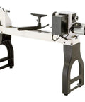 Heavy Hitter Three Hp Wood Lathe With 22 Inch Swing And 42 Inch Space Featuring Smooth Variable Speed Drive Up To 3200 Rpm side view showing motor and frame for bowl turning.