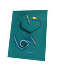 Anti Static Wrist Strap With Grounding Wire And ESD Mat Set For Phone Repair, Computer And Electronics Workstations displayed on a desk