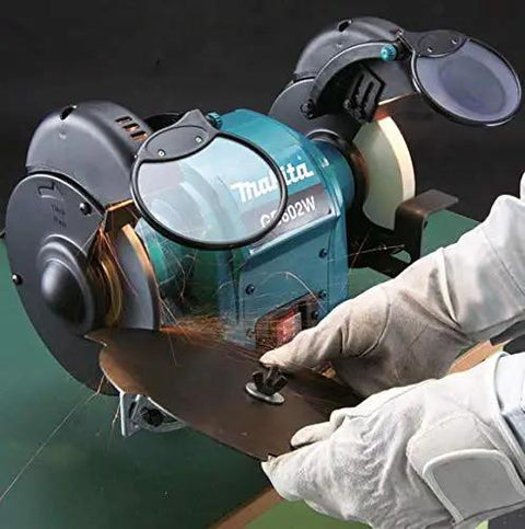 Heavy Duty 250 Watt Bench Grinder Featuring Dual Illuminated Work Lights And Rock Solid Base For Smooth Metal Grinding And Fast Tool Restoration In Any Home Garage Setup, with sparks flying while sharpening metal.