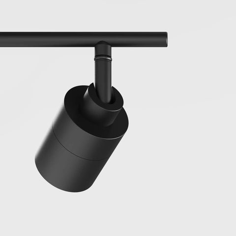 Side view of Shura Black 4-Head Adjustable Track Light Kit With Built-In LED Bulbs, showing one matte finish LED spotlight detail.